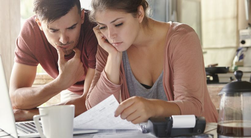 couple decided whether or not to get a fast bridging loan