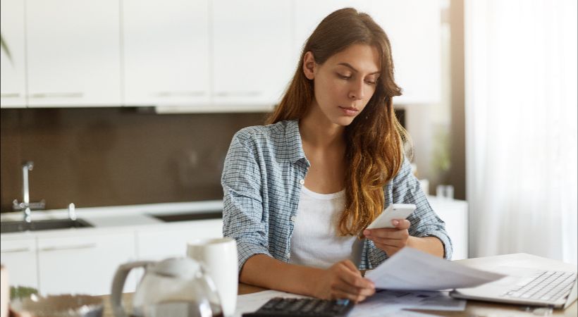 Woman worried about paying her bills