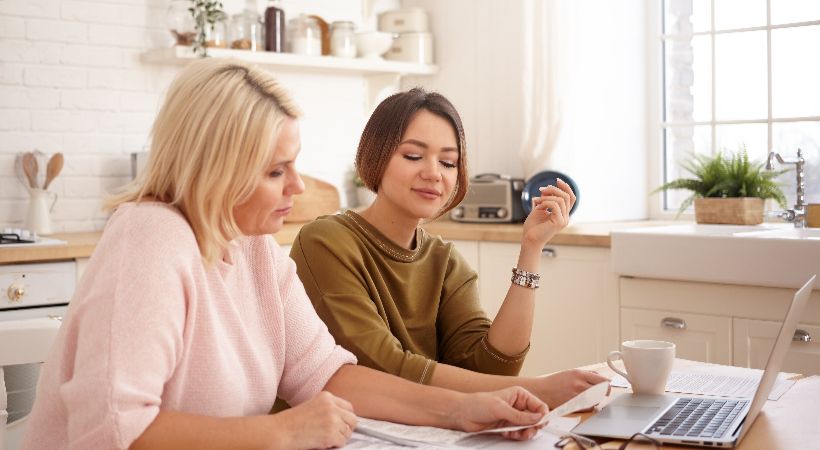Women working out their finance