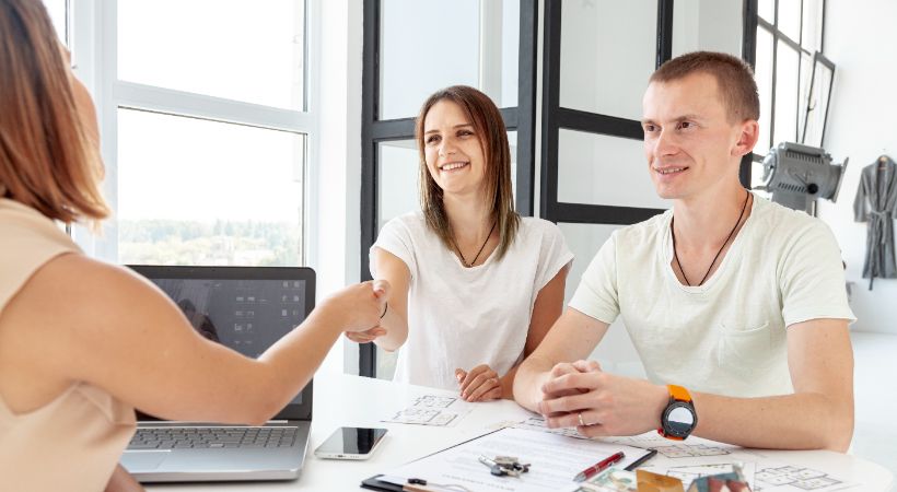 couple meeting with a lender