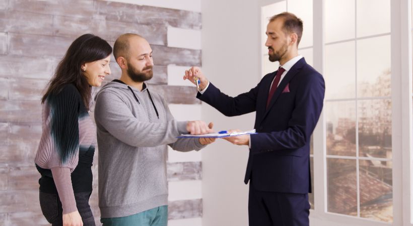 Investors receiving the keys for their property